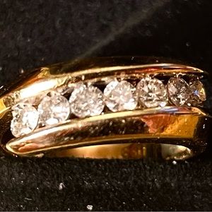 14 carat gold ring with 7 diamonds 0.70 ct.